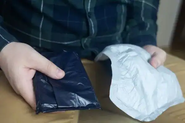 image of man holding stool incontinence Bath products